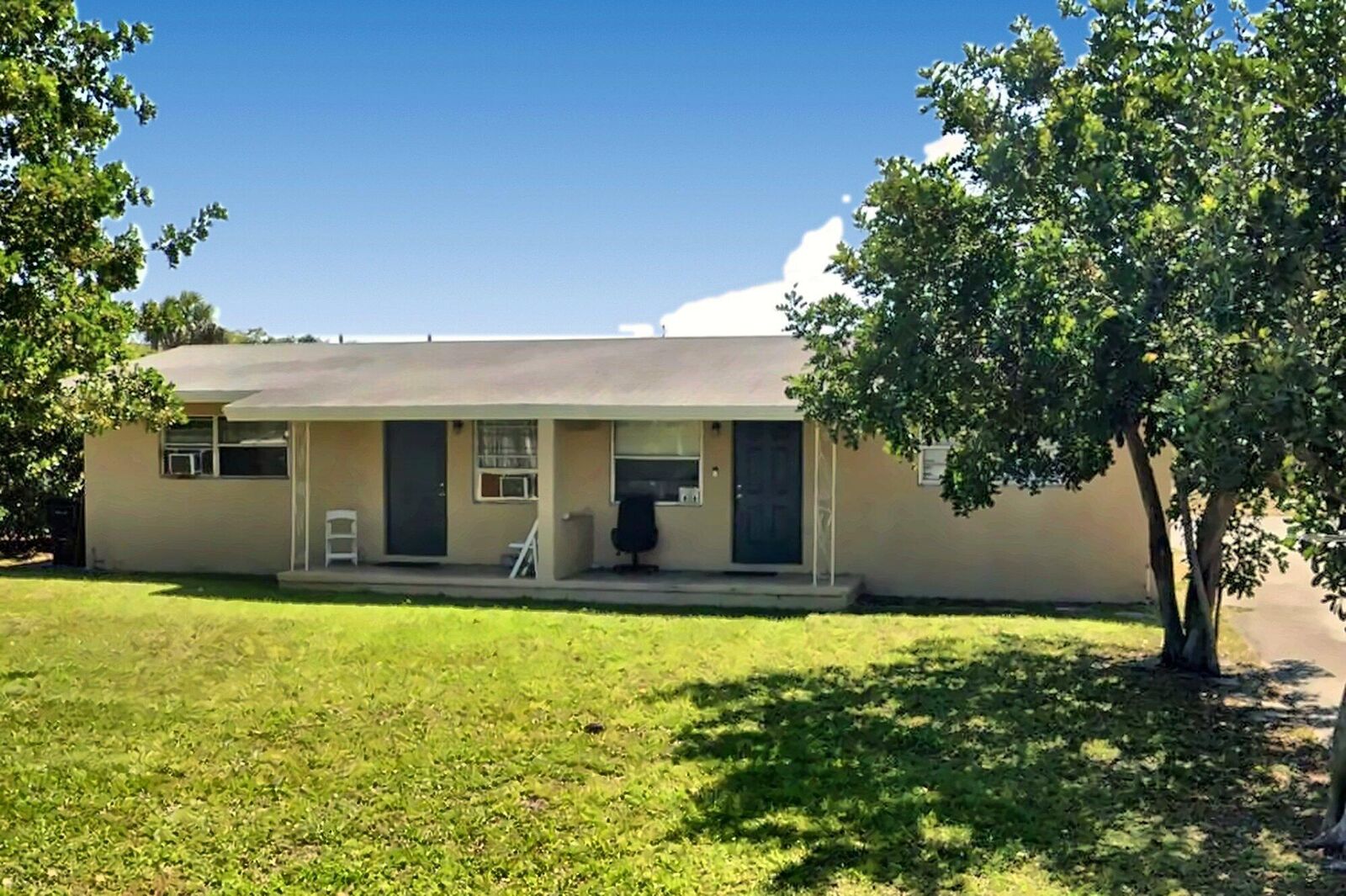 Property Photo: 133 NW 13th Avenue FL 33444