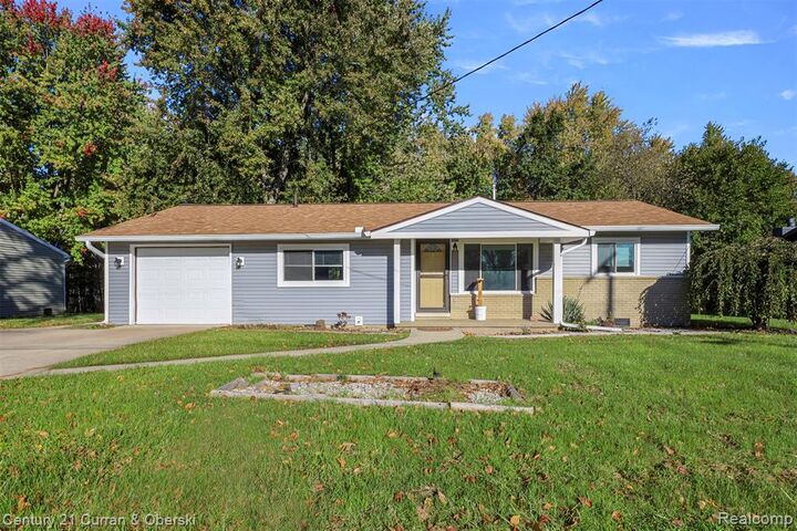 Property Photo:  201 W Peterson Drive  MI 48114 