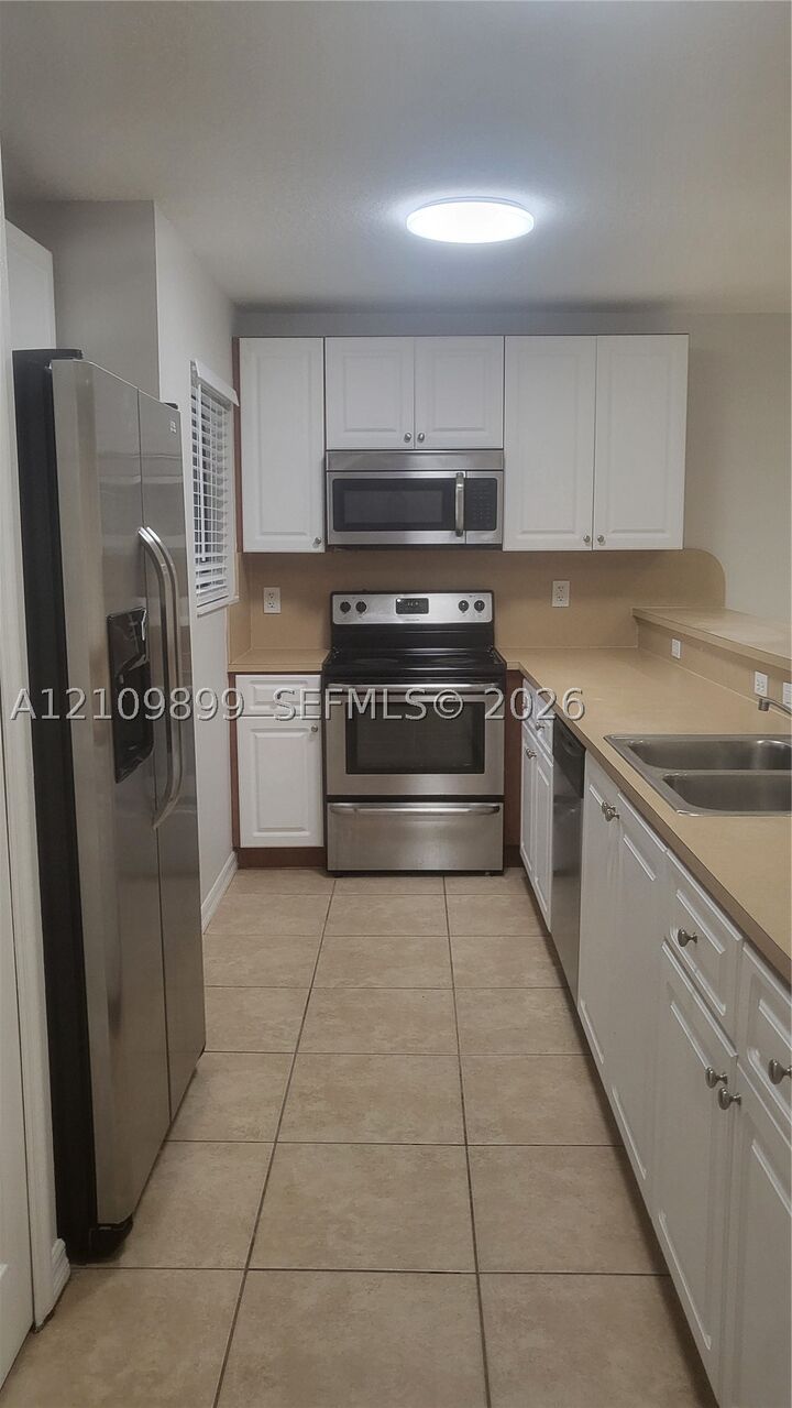 Property Photo:  22811 SW 88th Pl 8-22  FL 33190 