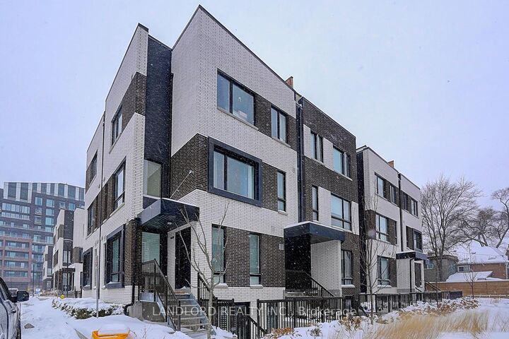 Property Photo: 30 Ed Clark Gardens Th13 ON M6N 0B5