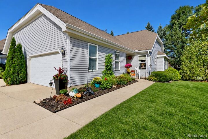 Property Photo:  2415 N Aurelius Road 42  MI 48842 