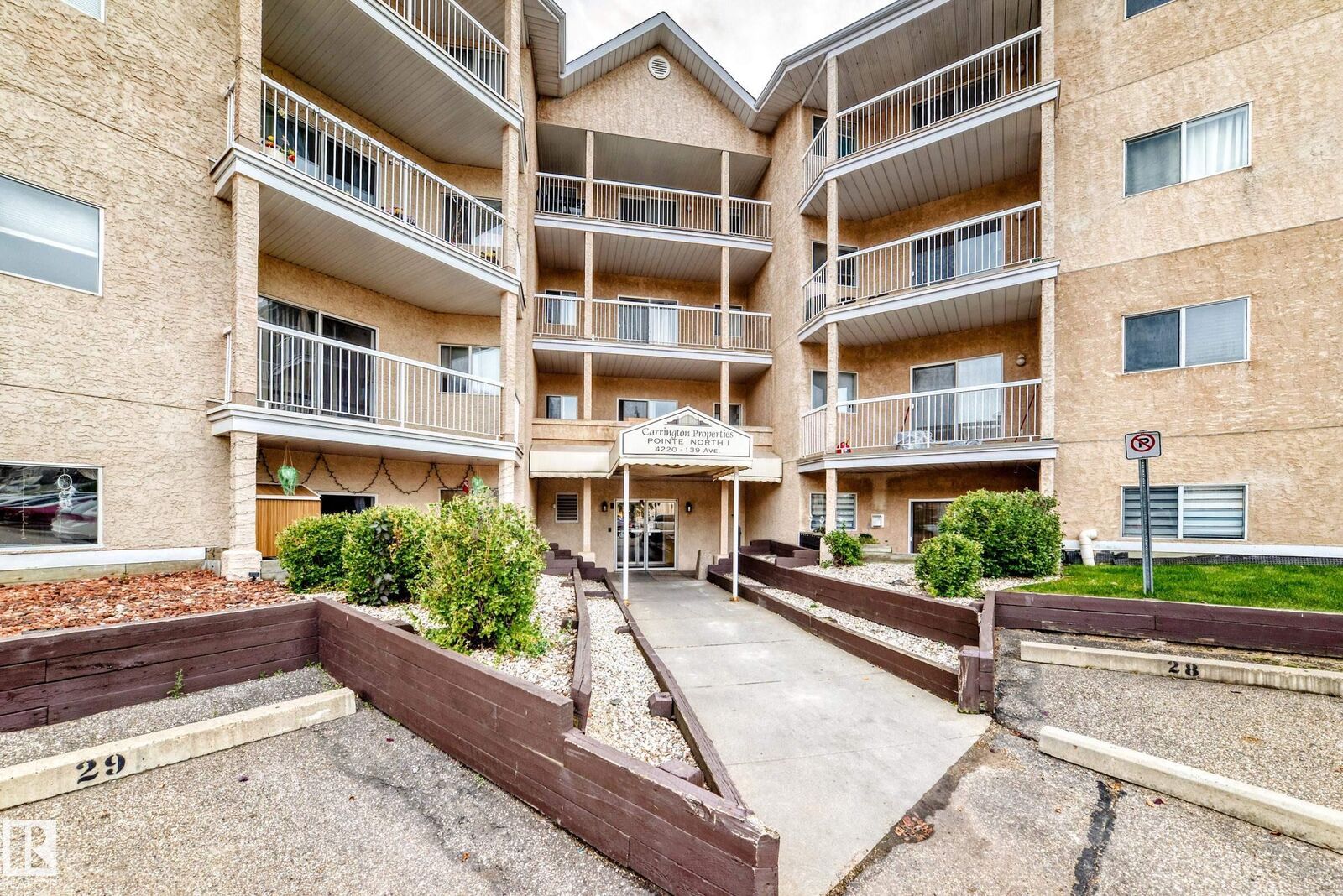 Property Photo:  4220 139 Avenue NW 201  AB T5Y 2Y2 