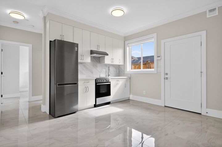 Property Photo:  7588 Armstrong Street Ground  BC V6Y 2S6 