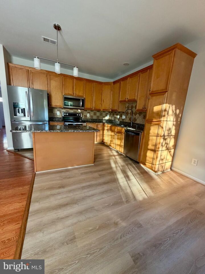Property Photo:  22557 Welborne Manor Square  VA 20148 
