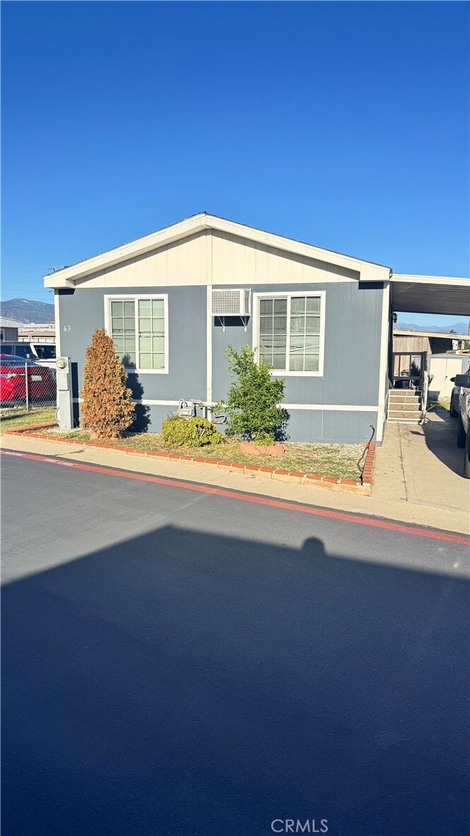 Property Photo:  2930 W Rialto Avenue 63  CA 92376 