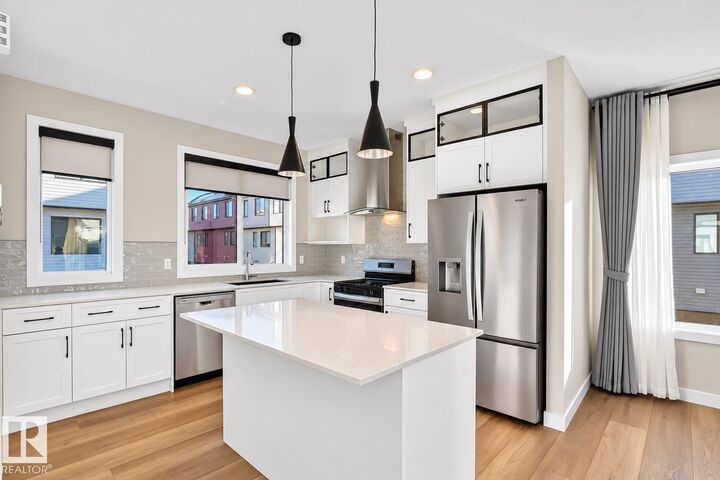 Property Photo: #1 11910 35 Av SW AB T6W 4Z8
