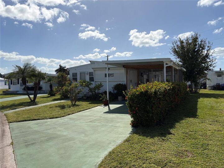 Property Photo:  4949 Oakland Hills Avenue  FL 34234 