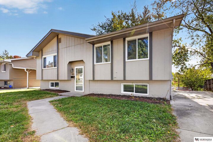 Property Photo: 7611 Teal Street NE 68128
