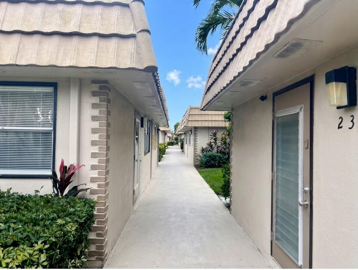 Property Photo:  233 Seville J Boulevard  FL 33484 
