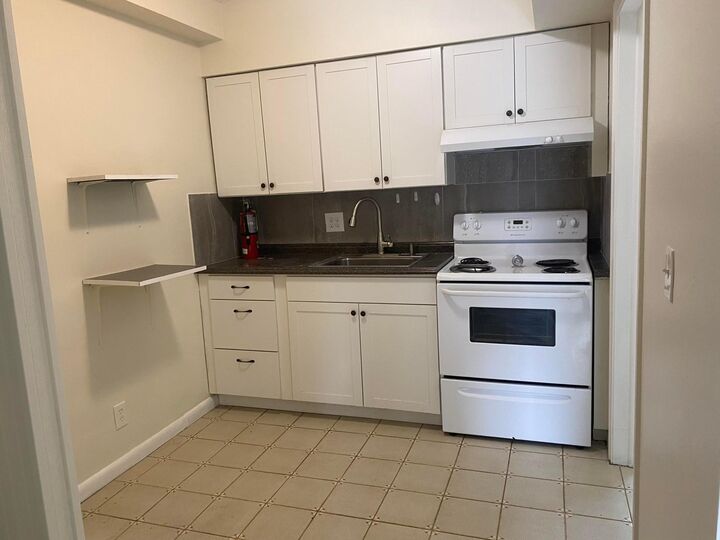 Property Photo:  701 NE 7th Avenue 2  FL 33483 