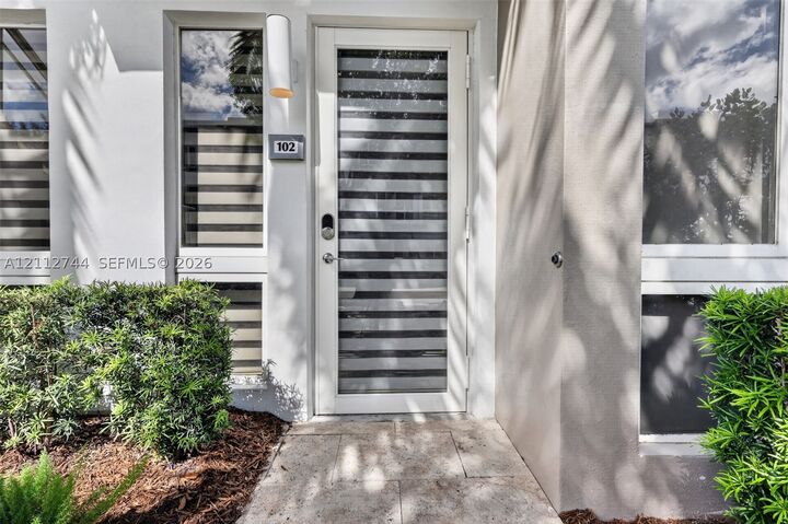 Property Photo:  10305 NW 63rd Ter 102  FL 33178 