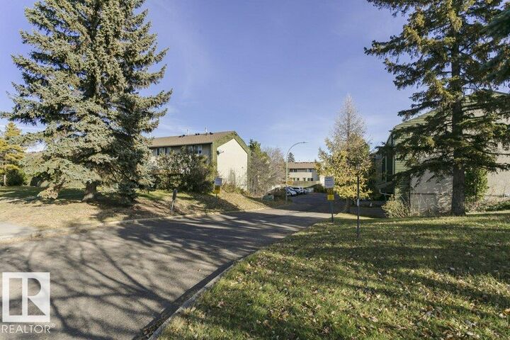 Property Photo:  879 Abbottsfield Road NW  AB T5W 4R4 