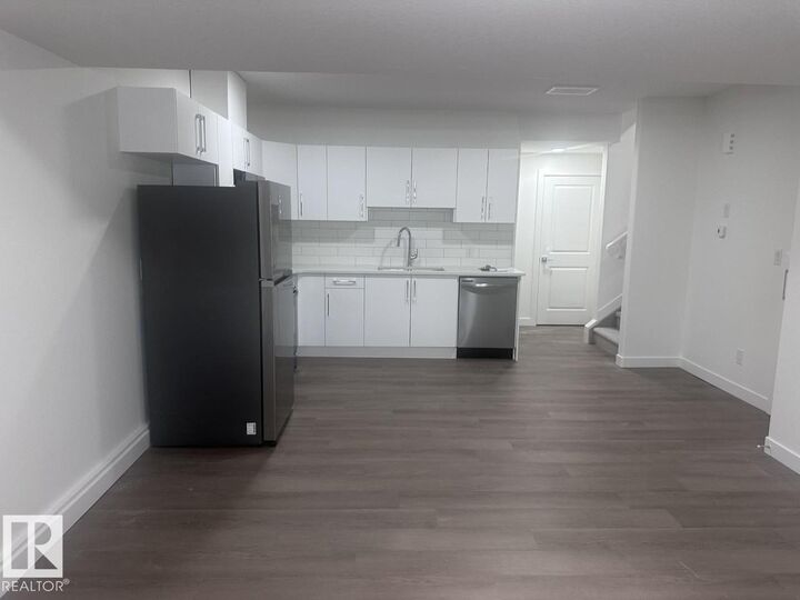 Property Photo:  6628 46 Avenue Bsmt  AB T4X 2Z4 