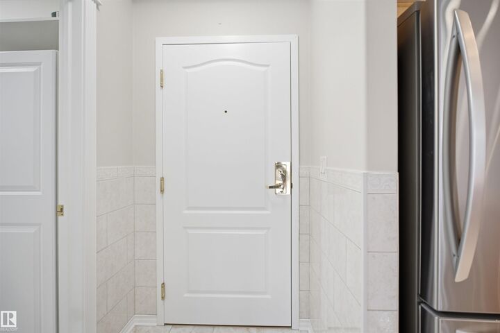 Property Photo:  14259 50 Street NW 221  AB T5A 5J2 