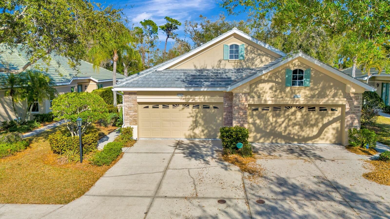 Property Photo: 5035 Lakescene Place FL 34243