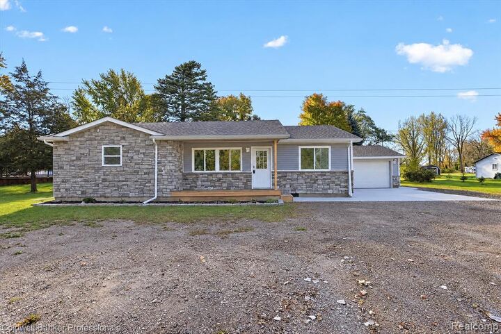 Property Photo: 3035 Ponemah Drive MI 48430