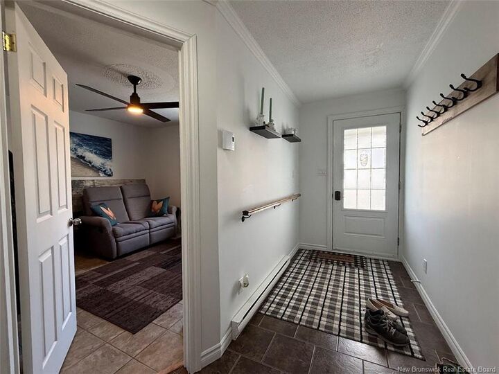 Property Photo:  832 Victoria Street  NB E3V 3T1 