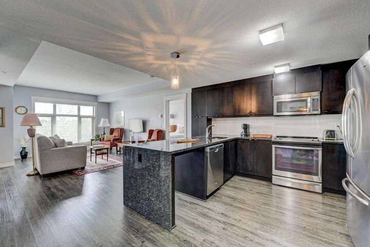 Property Photo:  45 Aspenmont Heights SW 213  AB T3H 0E6 