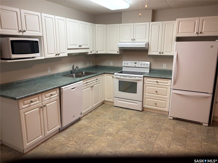 Property Photo:  122 Government Road NE 305  SK S4H 0P1 