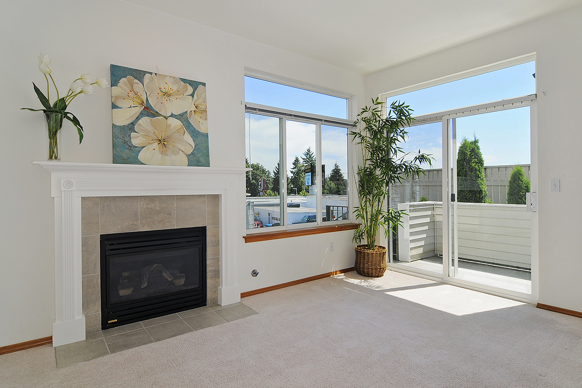 Property Photo: Living room, dining room, kitchen & bathroom 11326 25th Ave NE D  WA 98125 