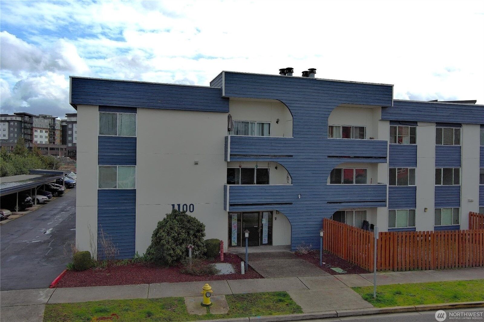 Property Photo:  1100  Harrington Avenue NE 205  WA 98056 