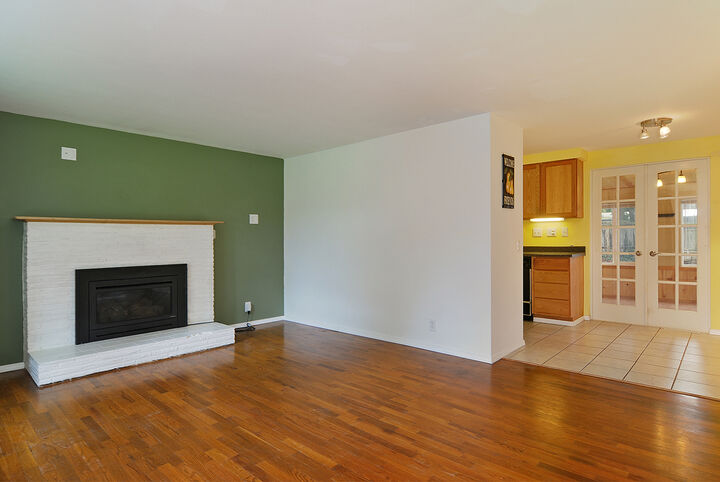 Property Photo: Living room/dining room/kitchen/sun room 20136 14th Ave S WA 98198