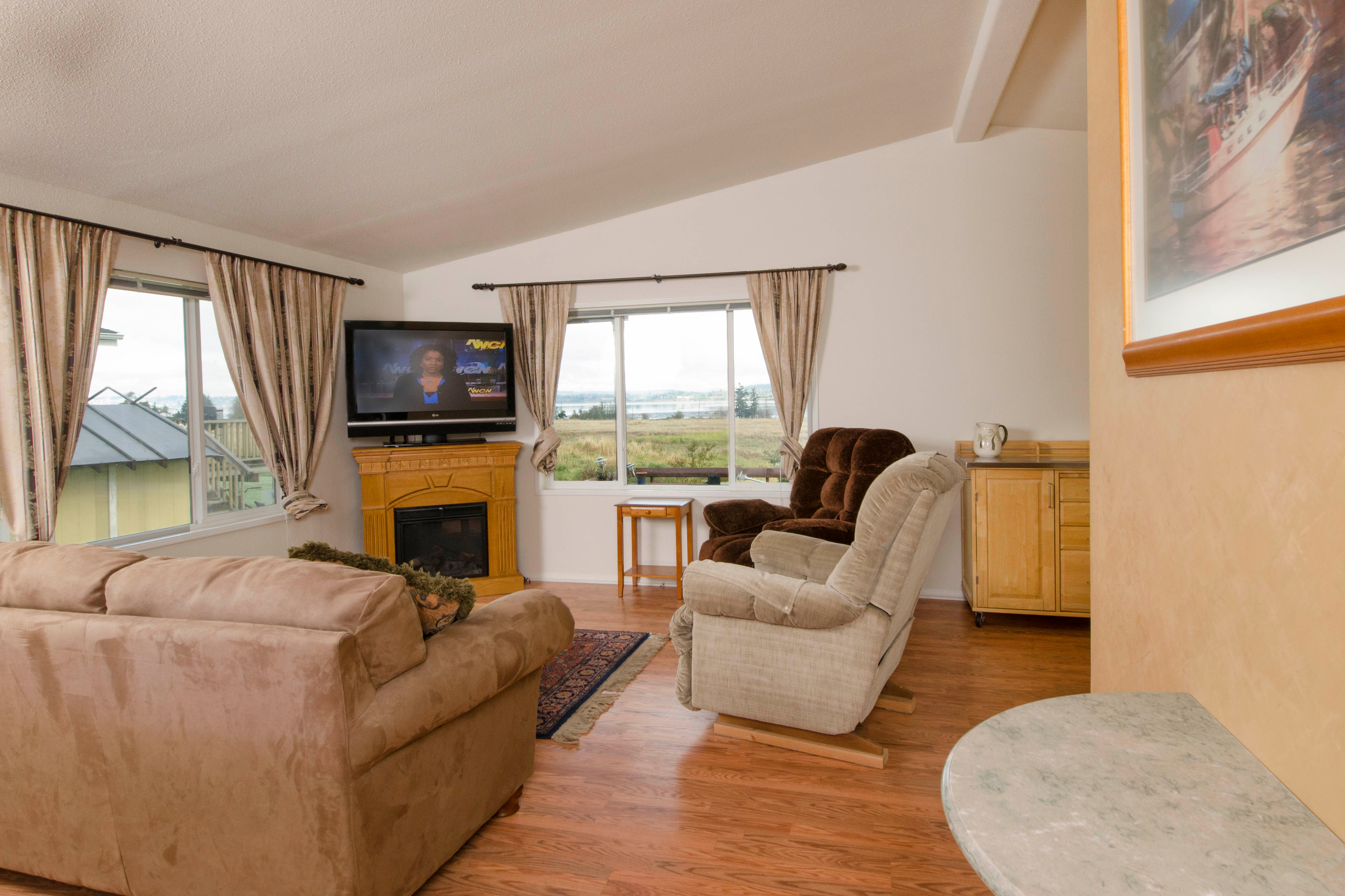 Property Photo: Living room 8585 Harborview Rd 5 WA 98230